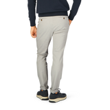 A person wearing Briglia's Light Grey Cotton Stretch BG62 Casual Chinos and a blue sweater.