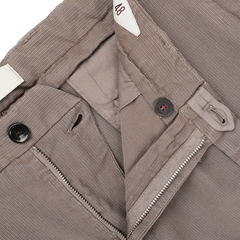 A close-up of the Mole Brown Cotton Twill BG21 Pleated Trousers by Briglia, showcasing the button and zipper details with the finesse of an Italian trouser specialist.