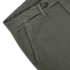 Close-up image of the waist and hip area of a pair of Moss Green Cotton Stretch BG62 Trousers by Briglia, showcasing a button closure and waistband detail in premium cotton twill.