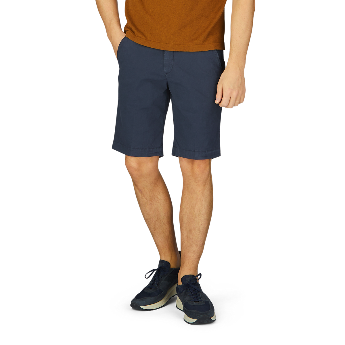 Man standing in Navy Blue Cotton Drawstring Malibu Shorts with an adjustable waistband from Briglia and sneakers.