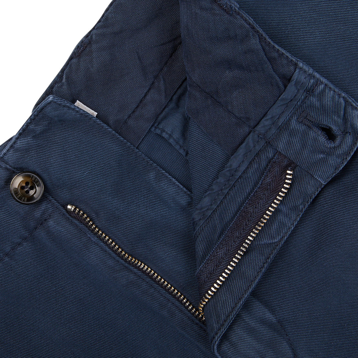 Close-up of a Briglia navy blue cotton linen pleated shorts with a zipper pocket detail and an adjustable waistband.