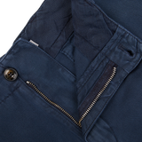 Close-up of a Briglia navy blue cotton linen pleated shorts with a zipper pocket detail and an adjustable waistband.