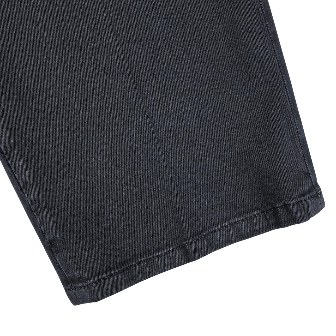 Close-up view of the bottom hem of a pair of slim fit, dark-colored Briglia Navy Blue Cotton Stretch BG62 Trousers on a light gray background.