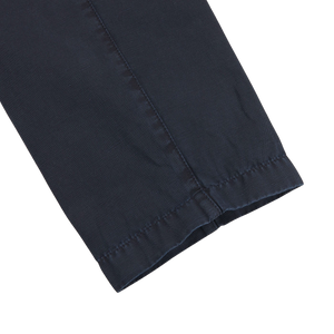 A close up of a pair of Briglia navy slim fit pants made from an upcycled mix of cotton and linen - the Navy Blue Cotton Linen BG59 Pleated Chinos.