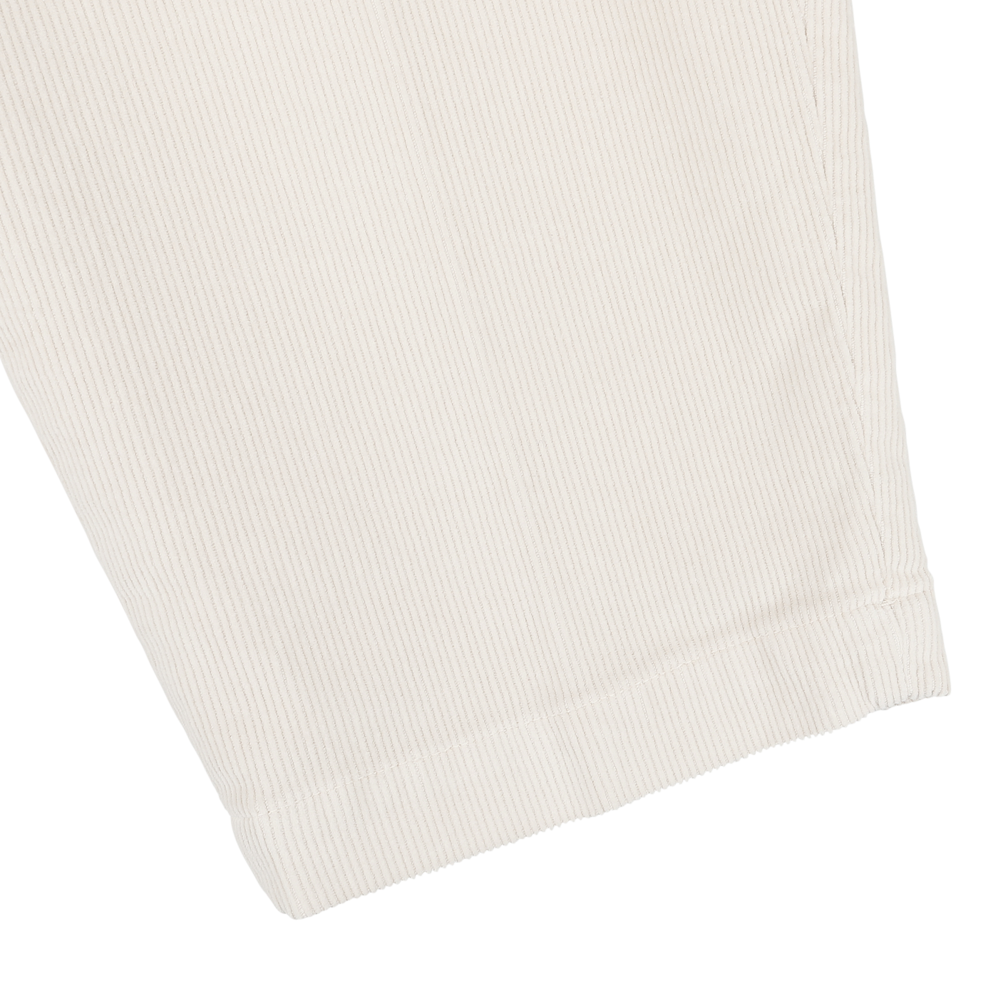 Close-up of the hem of Briglia's Off White Corduroy Courmayeur Trousers, showcasing the cream-colored, ribbed fabric reminiscent of classic chinos. The seamless stitching and vertical lines of the cotton corduroy texture are visible.