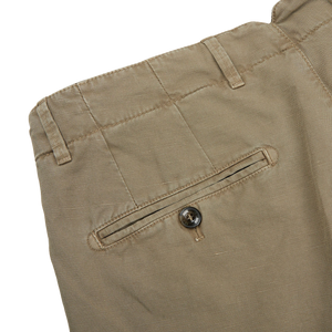 A pair of Olive Cotton Linen BG59 Pleated Chinos with buttons on the side, made by Briglia - an Italian specialist.