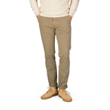 A man wearing a tan sweater and Briglia Olive Green Cotton Stretch BG62 Casual Chinos.