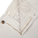 Stone Beige Cotton Linen Pleated Shorts with pocket and zipper detail by Briglia.
