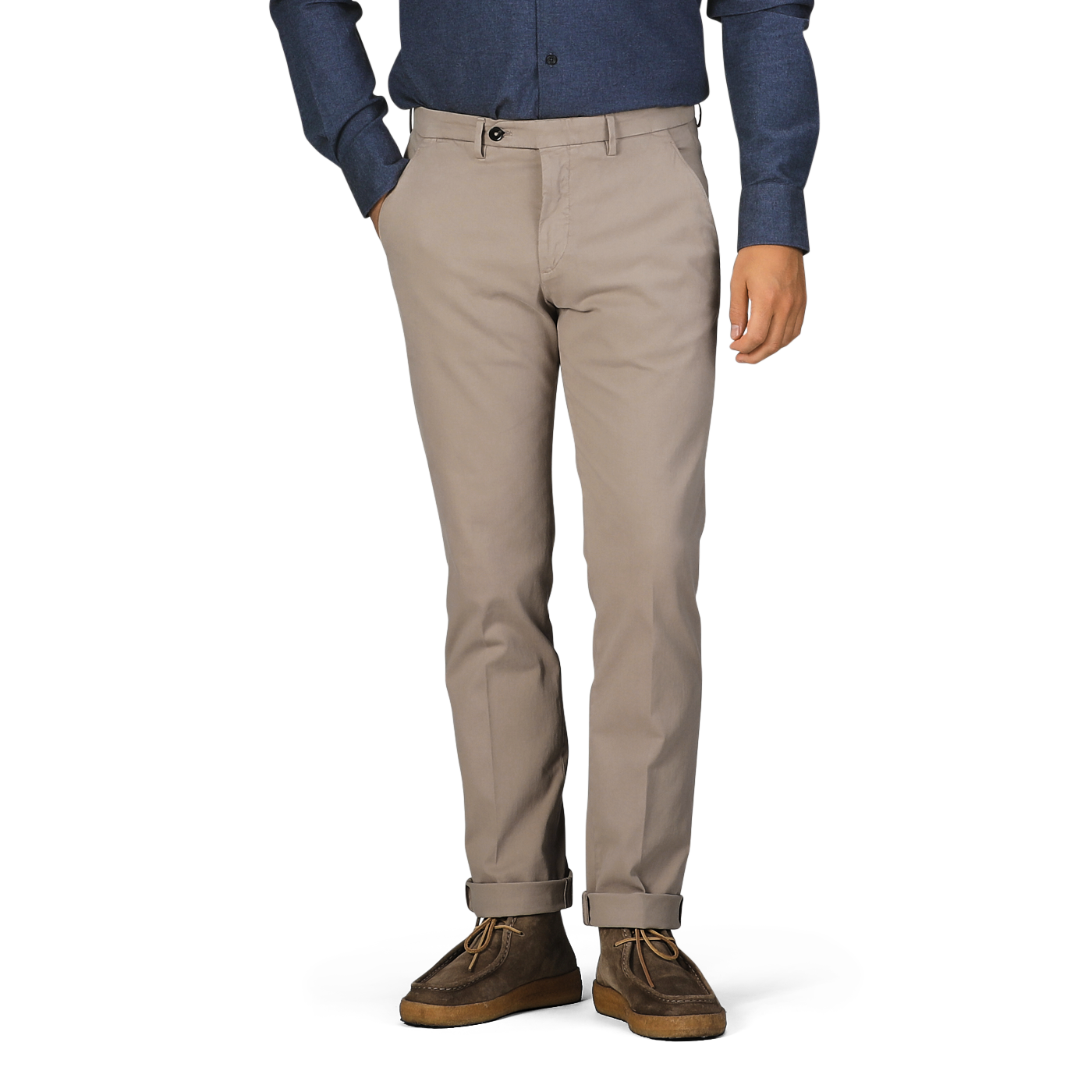 A person wearing Briglia Taupe Beige Cotton Stretch BG62 Trousers, a blue long-sleeve shirt, and brown shoes stands with their hands in their pockets.