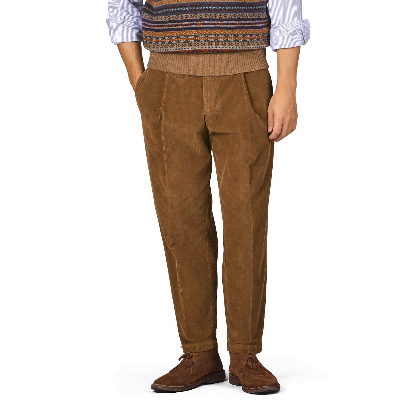 Person wearing Briglia Tobacco Pleated Corduroy Courmayeur Trousers, a blue shirt with rolled-up sleeves, and a sweater vest with a patterned design. Hands in pockets. Only the lower half of the body is visible.