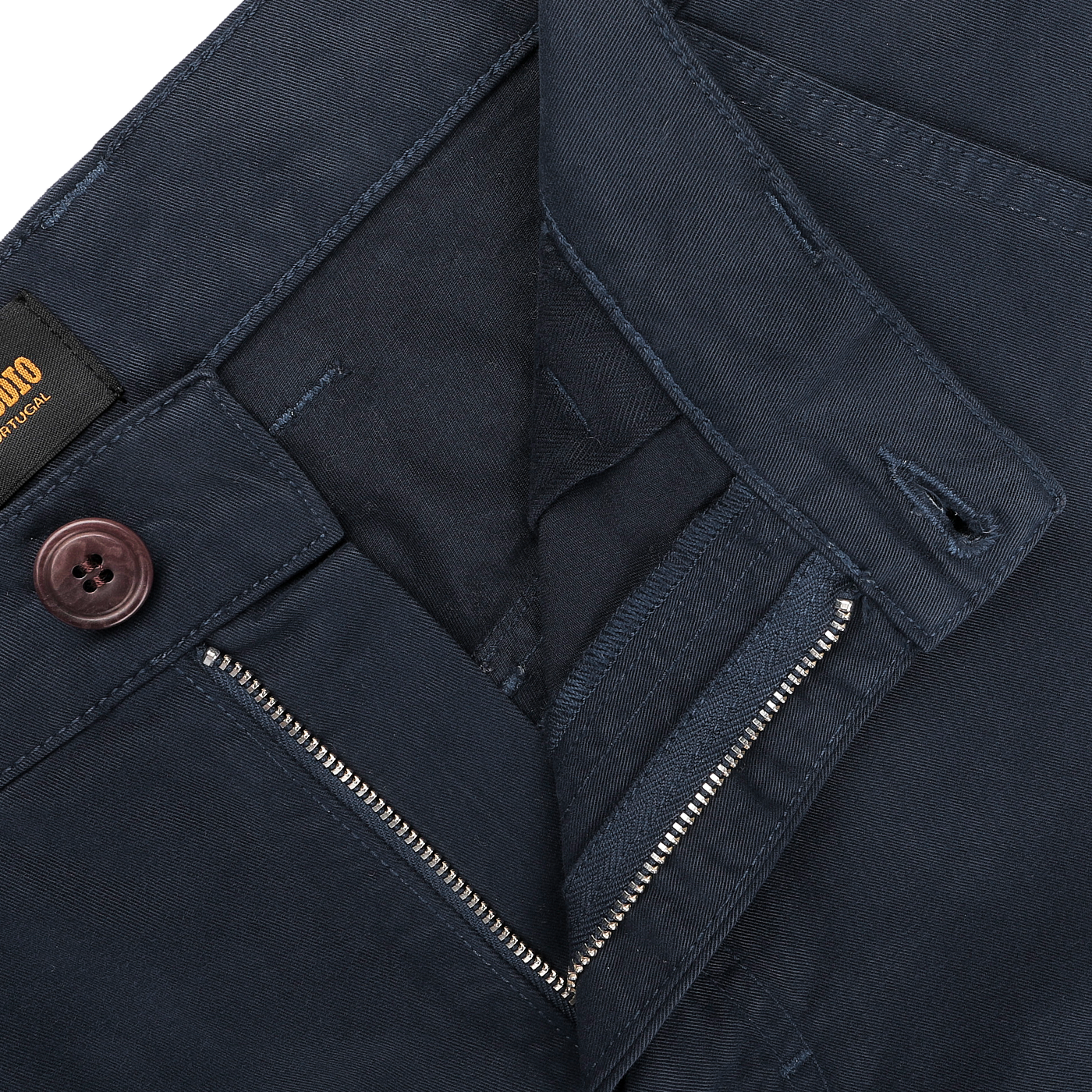 Close-up image of C.O.F Studio's Blue Double Twisted Cotton Twill Fatigue Pants, featuring a visible zipper, button, and pocket.