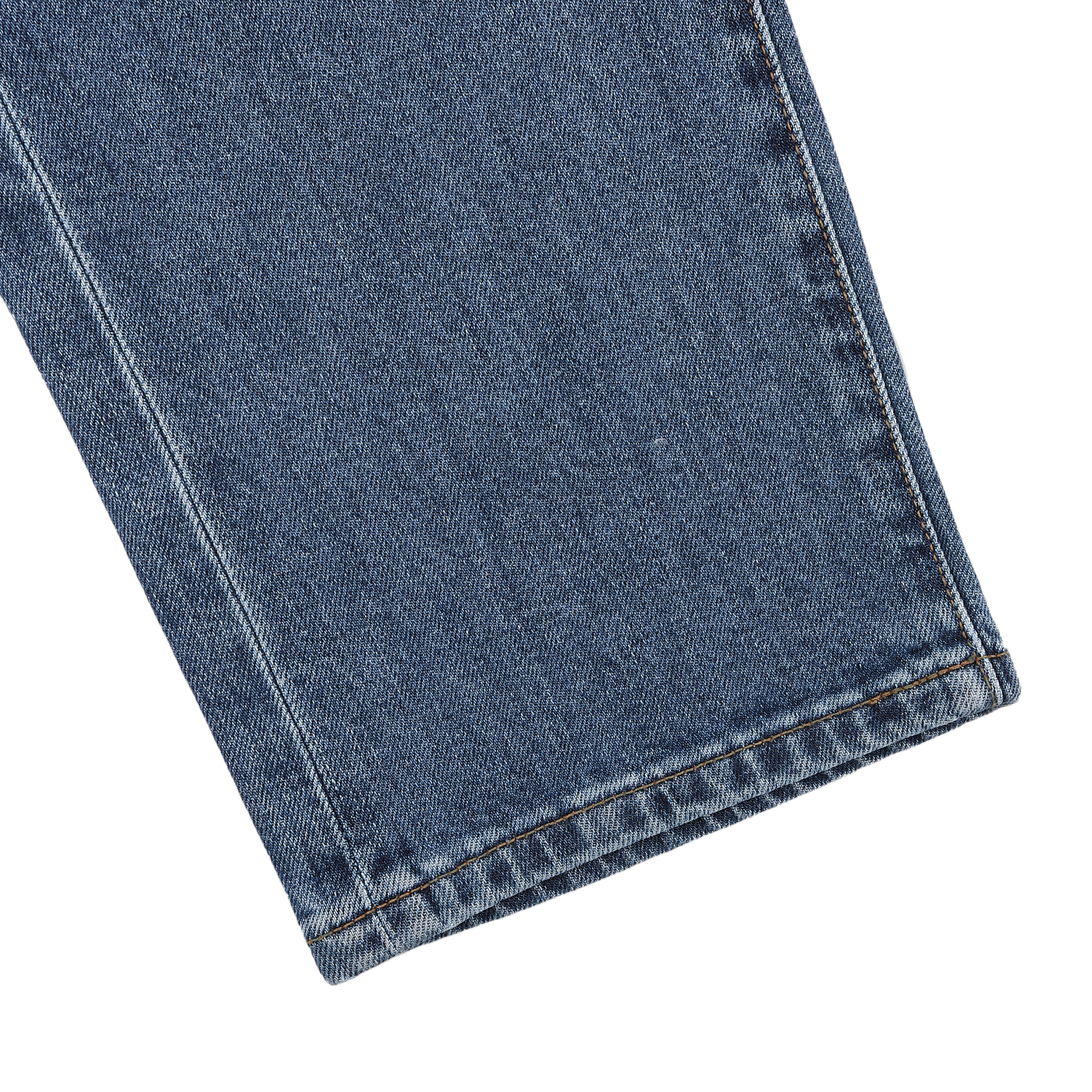 Close-up of the hem of Indigo Blue Washed Organic Cotton M8 Jeans from C.O.F Studio on a pristine white background.