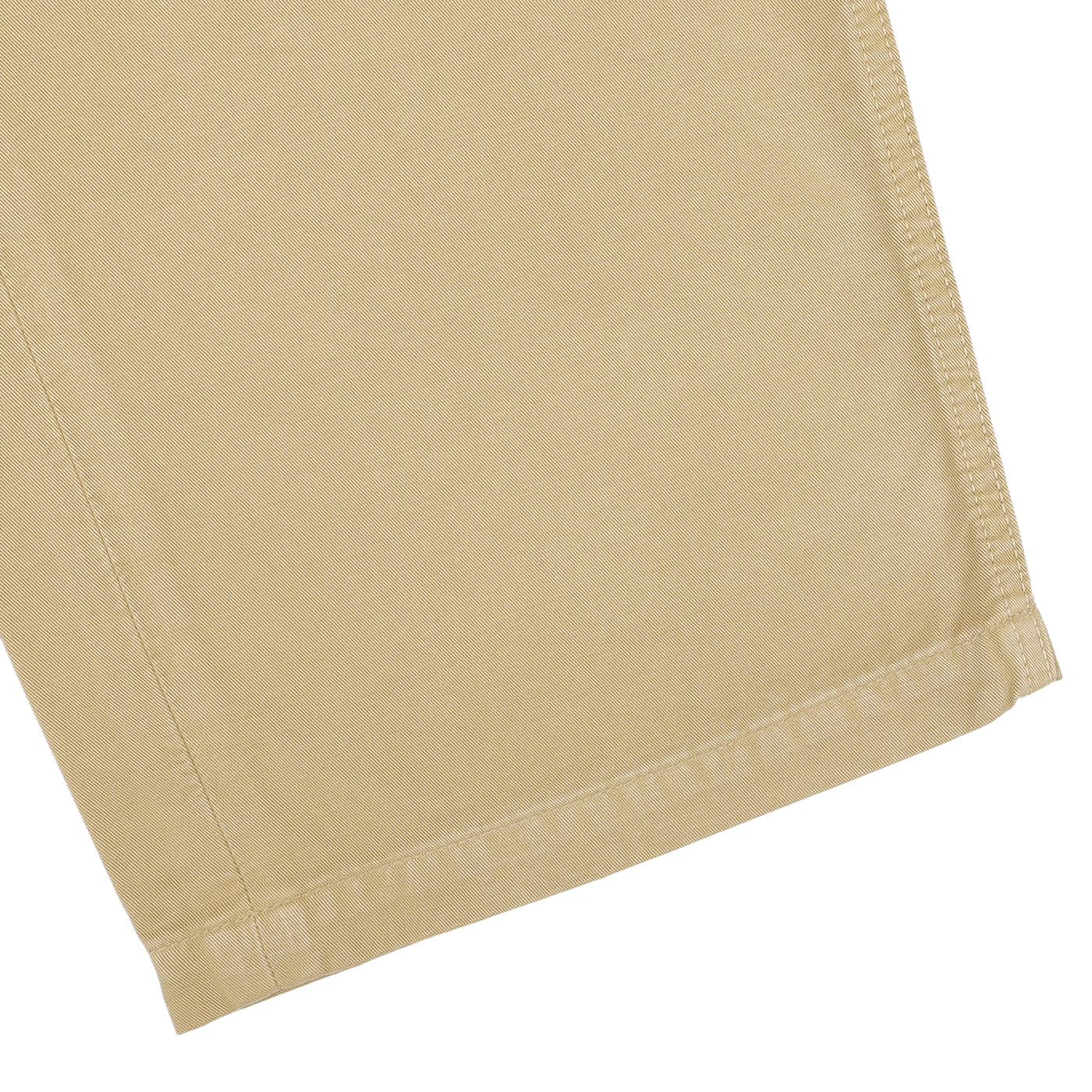 Close-up of the khaki fabric with a visible seam in the corner, crafted from soft cotton twill by C.O.F Studio for their Double Twisted Cotton Twill Fatigue Pants.