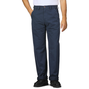 A person wearing C.O.F Studio's Blue Double Twisted Cotton Twill Fatigue Pants and black shoes stands with hands in pockets against a plain background.