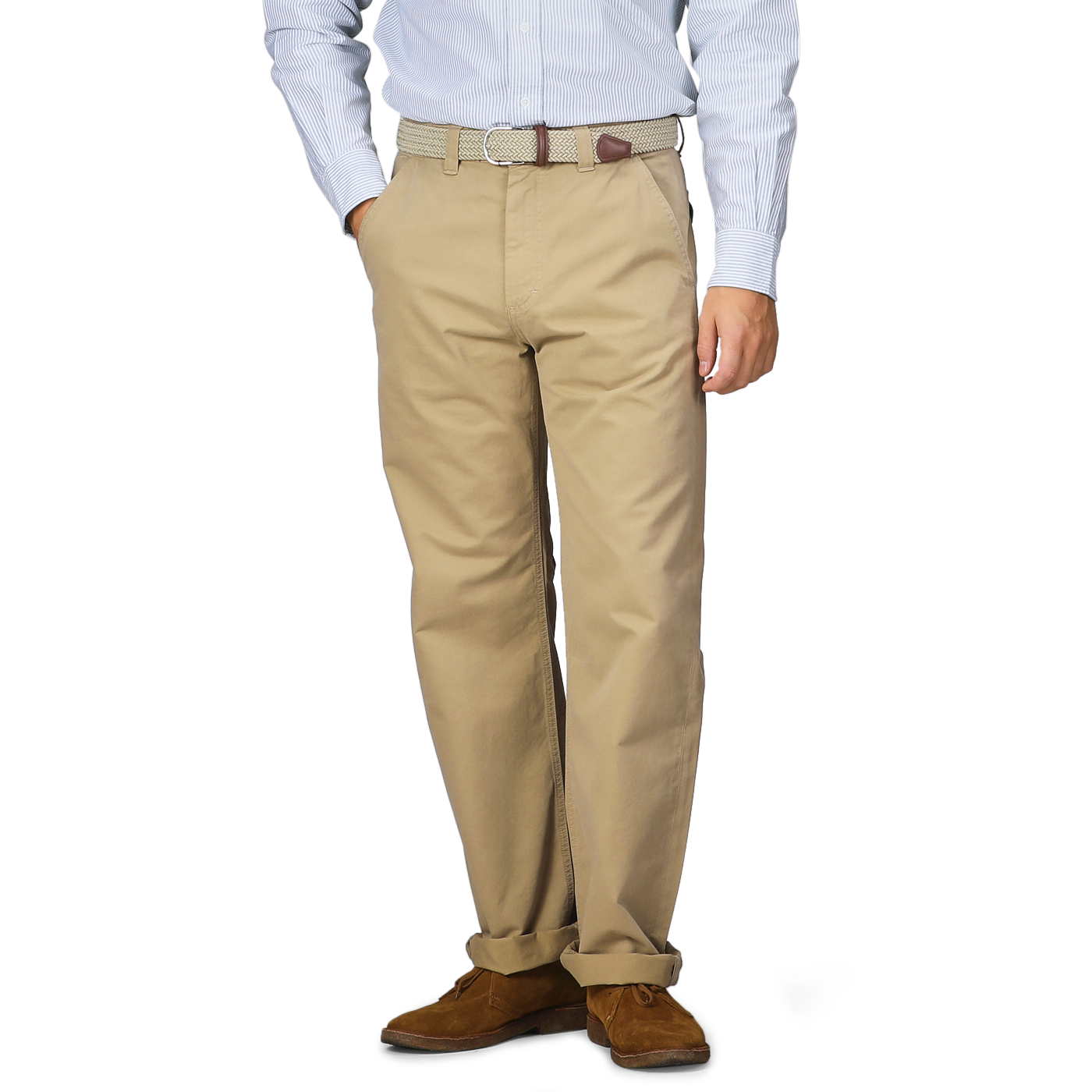 A person wearing a striped shirt, Khaki Double Twisted Cotton Twill Fatigue Pants from C.O.F Studio, and brown shoes is standing. The fatigue pants are secured with a textured belt.