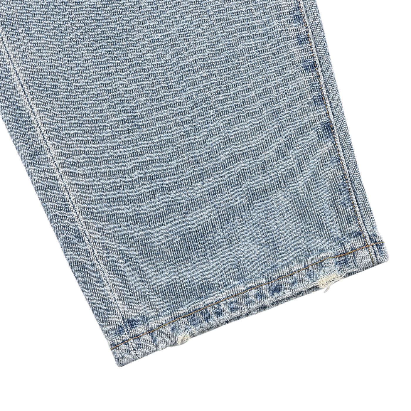 Close-up of C.O.F Studio's Light Blue 90's Wash Organic Cotton M8 Jeans, featuring visible stitching and slight fraying on Kuroki Selvedge denim.