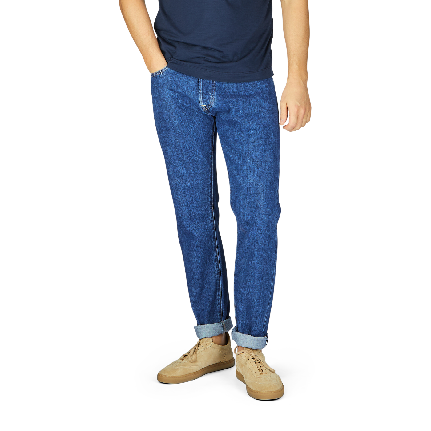 Man wearing C.O.F Studio Blue Organic Kurioki Cotton M7 6x Wash Jeans and beige shoes, cropped at chest level against a white background.