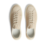 A pair of Beige Suede Leather Racquet sneakers with white laces, displayed from above on a striped background.