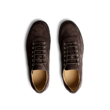 A pair of Chocolate Brown Suede Leather Roamer Sneakers by CQP with a simple lace-up design, viewed from above.