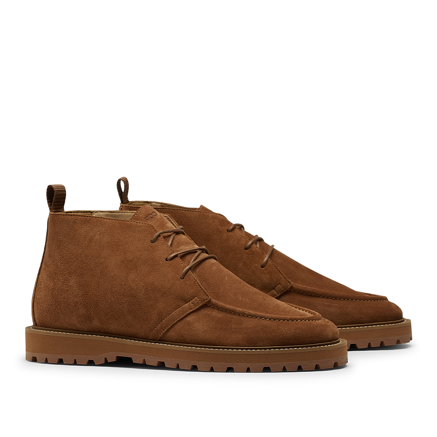 CQP Cognac Suede Leather Astra Dessert Boots feature a suede upper in a rich cognac brown, laces, and rugged rubber soles.