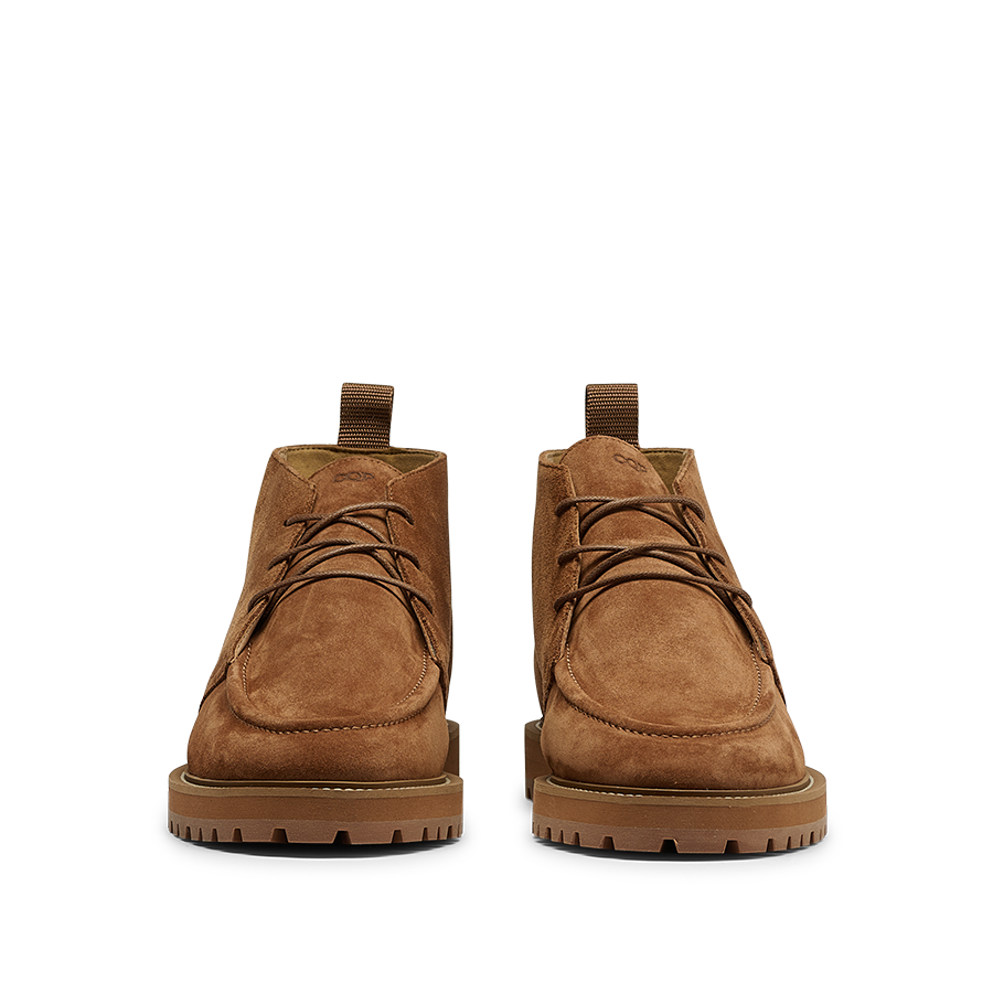 A front view of the Cognac Suede Leather Astra Dessert Boots by CQP, featuring a lace-up design and rugged rubber soles.