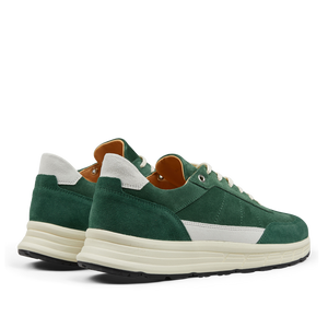 A pair of Court Green Suede Leather Renna sneakers by CQP with white accents and a VIBRAM chunky white sole, made from premium materials.