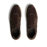 A pair of CQP Dark Brown Suede Leather Stride Runners with dark laces, viewed from above on a transparent background.