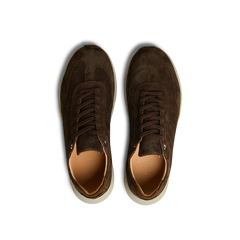 A pair of Dark Brown Suede Leather Renna Sneakers by CQP with beige interiors and VIBRAM white soles, viewed from above, showcasing premium materials.