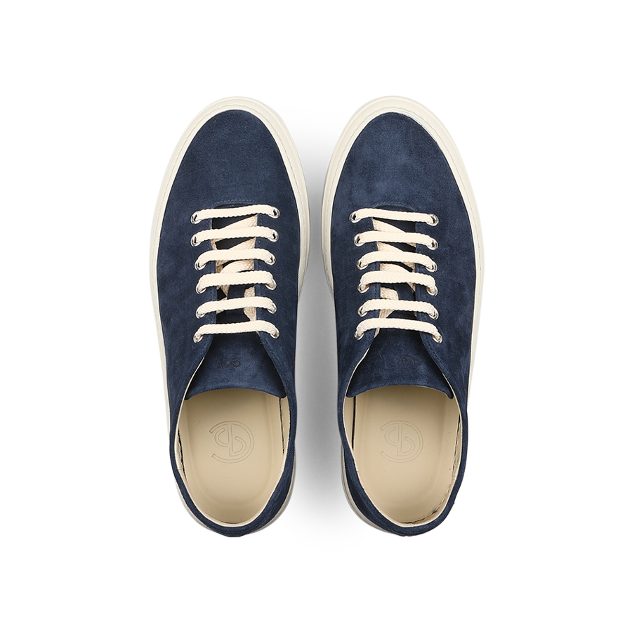 CQP's Indigo Blue Textured Suede Genoa Sneakers feature white laces and beige soles, offering style and arch support.