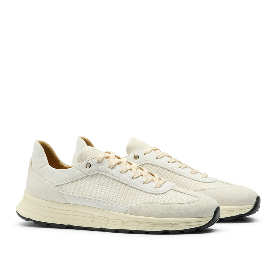 CQP's Ivory Suede Leather Renna Mesh Sneakers feature a lace-up front, VIBRAM rubber soles, and side mesh detailing.