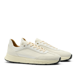 CQP's Ivory Suede Leather Renna Mesh Sneakers feature a lace-up front, VIBRAM rubber soles, and side mesh detailing.