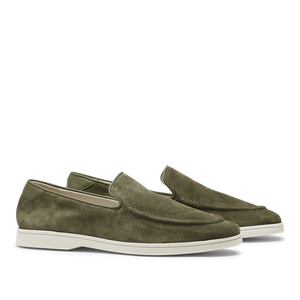 These CQP men's Juniper Green Suede Leather Debonair Slippers feature white rubber soles. Designed by a Swedish designer, they offer a sleek and modern look.