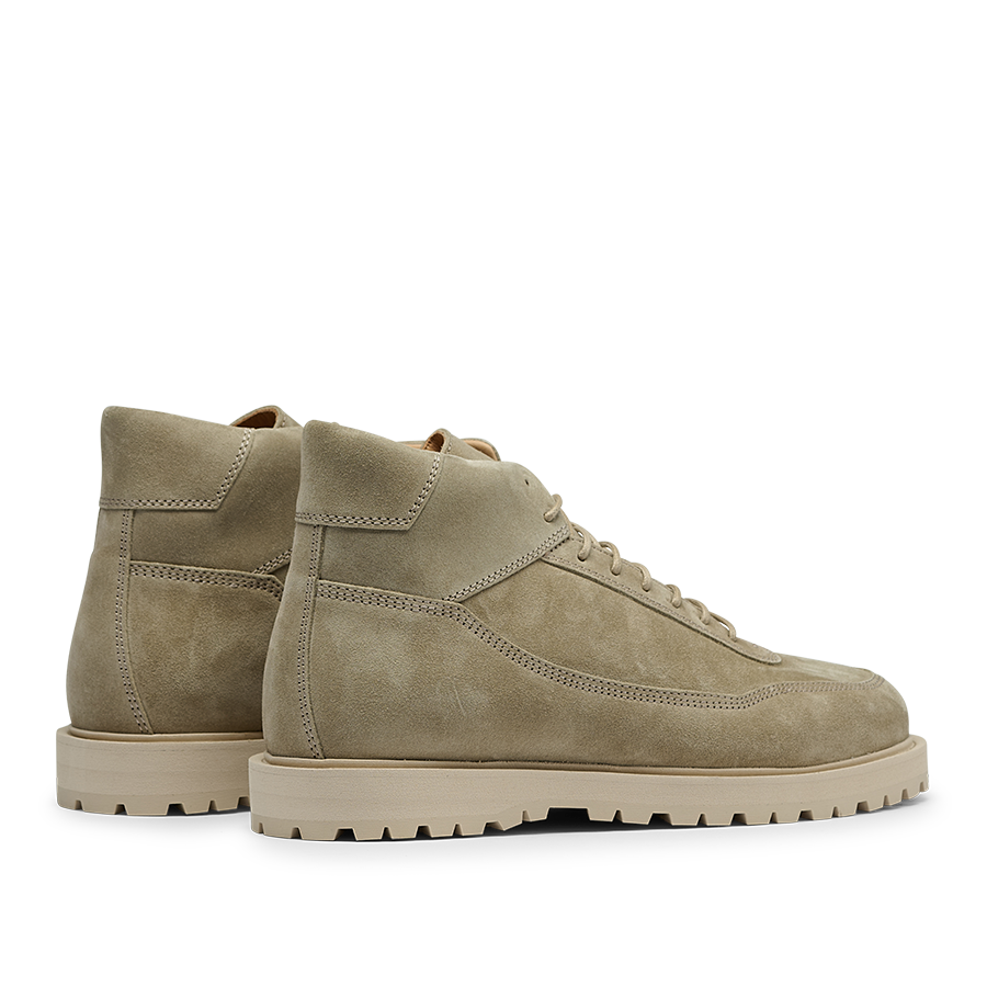 A pair of CQP Light Beige Suede Leather Sabulo Boots with rugged, water-repellant rubber soles placed side by side, facing right.