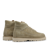 A pair of CQP Light Beige Suede Leather Sabulo Boots with rugged, water-repellant rubber soles placed side by side, facing right.