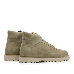 A pair of CQP Light Beige Suede Leather Sabulo Boots with rugged, water-repellant rubber soles placed side by side, facing right.