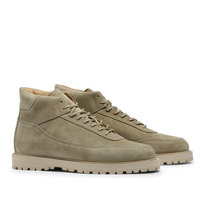 A pair of CQP Light Beige Suede Leather Sabulo Boots featuring a suede upper, white laces, and off-white rubber soles, displayed on a plain background.