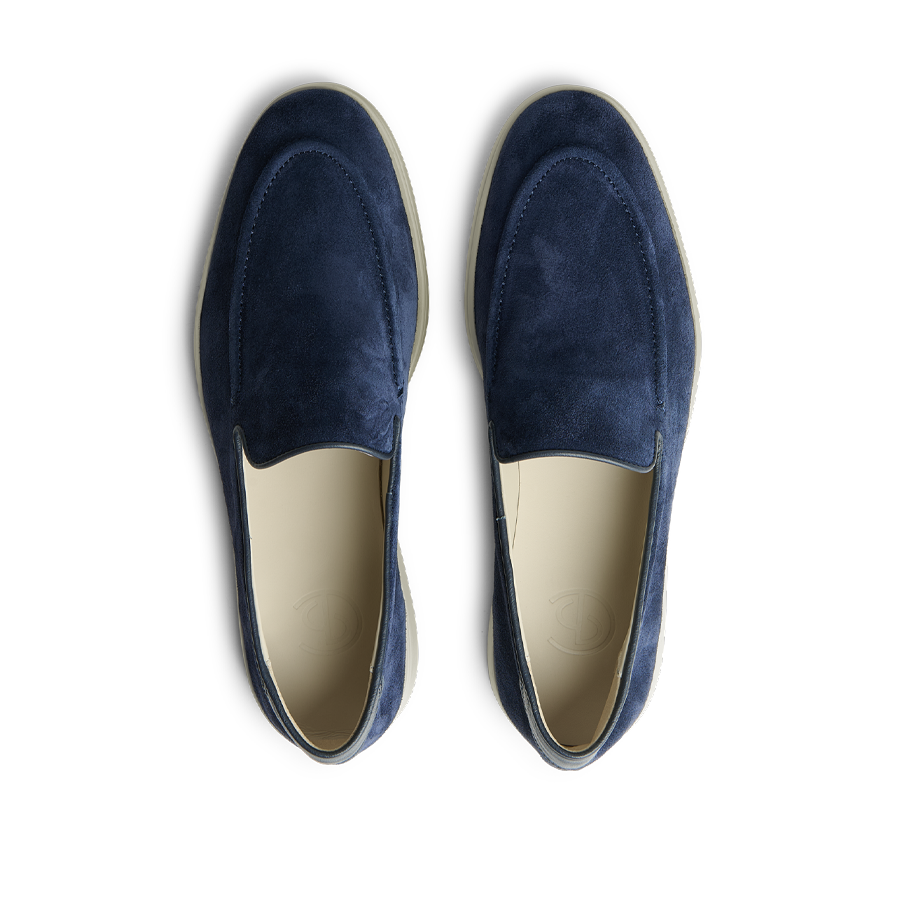 A pair of Navy Blue Suede Leather Debonair Slippers with light tan interiors, by CQP, viewed from above.
