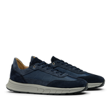 A pair of Navy Suede Leather Renna Mesh Sneakers from CQP, featuring navy blue suede leather with white soles, mesh detailing, and premium materials complemented by a VIBRAM sole for unparalleled comfort.