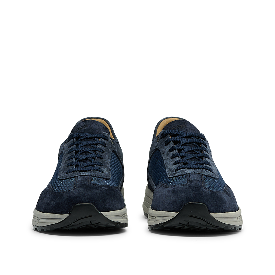 A pair of Navy Suede Leather Renna Mesh Sneakers from CQP, featuring white VIBRAM soles, are shown from the front, placed side by side against a white background.