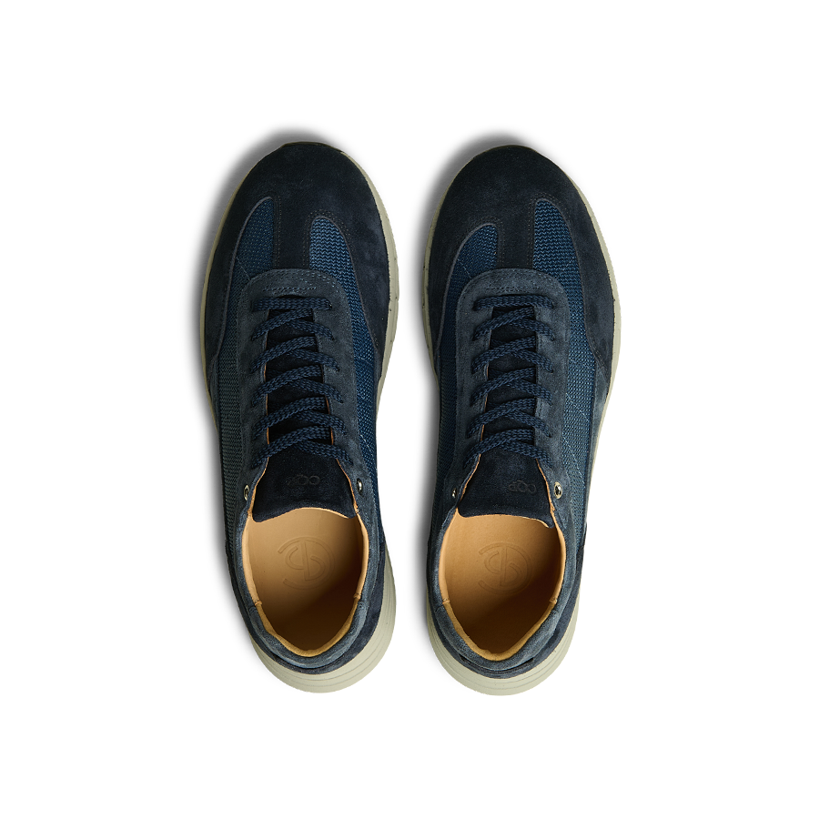 Top view of a pair of Navy Suede Leather Renna Mesh Sneakers by CQP, featuring a beige inner lining and light-colored VIBRAM soles, crafted from premium materials.