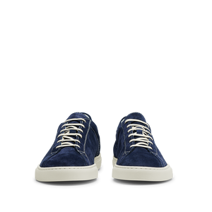 A pair of Navy Blue Suede Leather Racquet Sneakers with white laces by CQP.