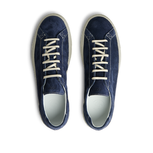 A pair of handmade Navy Blue Suede Leather Racquet Sneakers with white laces by CQP.
