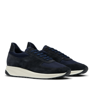 The men's Obsidian Blue Suede Stride Runners with white soles are an everyday shoe choice from CQP.