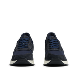 A pair of Obsidian Blue Suede Leather Stride Runners with white Gommus soles, viewed from the top on a transparent background by CQP.