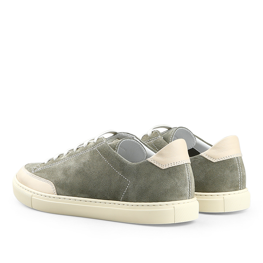 The Olive Green Suede Leather Bumper Sneakers by CQP feature beige accents and white soles, viewed from the back, capturing the charm of retro tennis shoes.