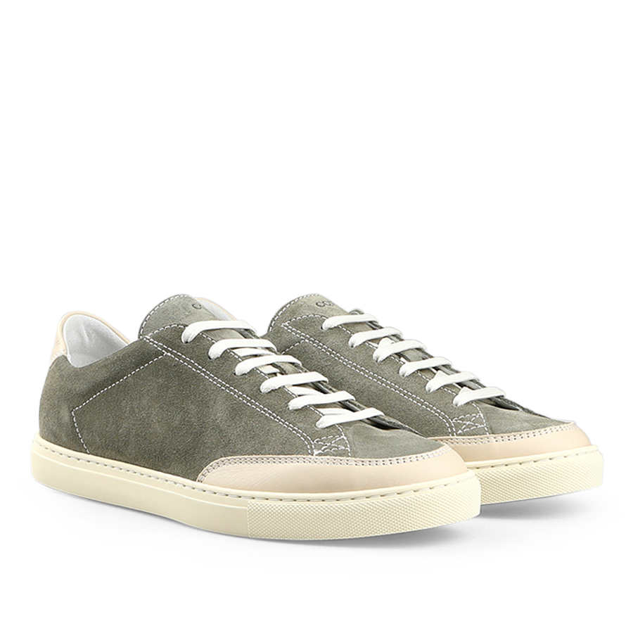 The Olive Green Suede Leather Bumper Sneakers by CQP, featuring white laces and beige accents, are displayed on a white background.