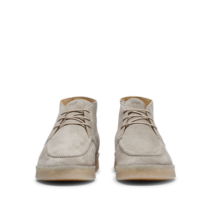 A pair of Taupe Beige Suede Leather Plana Boots with crepe soles and laces, viewed from the front, isolated on a white background.