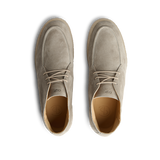 A pair of Taupe Beige Suede Leather Plana Boots with laces, viewed from above, set against a transparent background.