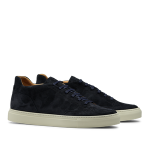 A pair of Prussian Blue Suede Leather Scion Sneakers by CQP, with a thick, cream-colored rubber sole, displayed side by side on a transparent background.