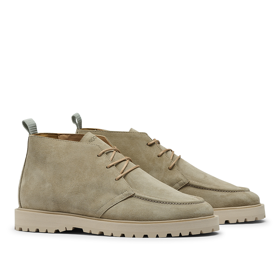 Introducing the Tan Beige Suede Leather Astra Boots by CQP, a pair of contemporary chukka boots crafted from beige suede with tan laces, a supportive rubber sole, and a convenient pull tab on the back.